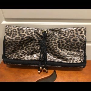 👜 large BeBe animal print clutch. Excellent cond.